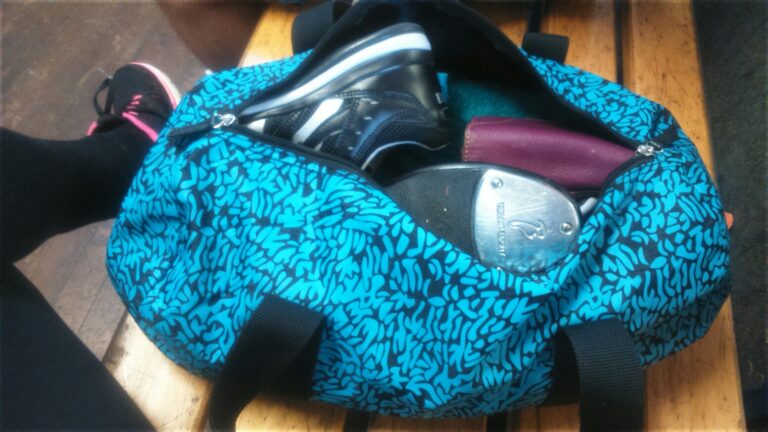 Image of open dance bag with shoes poking out